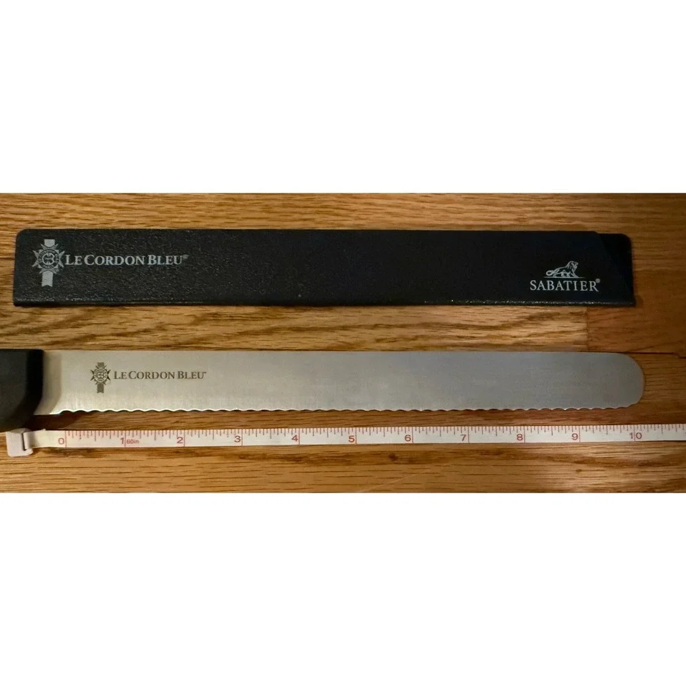 Vintage Sabatier France 10-inch serrated LeCordon Bleu knife, made in France.